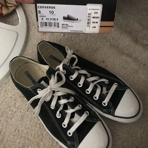 Women/Men’s Black and White Converse
